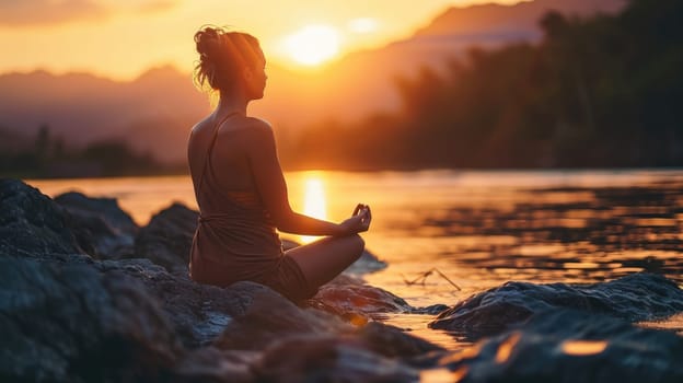 The picture of the young or adult female human doing the yoga pose for relaxation or meditating the mind in the middle of the nature under the bright sun in the daytime of a dawn or dusk day. AIGX03.