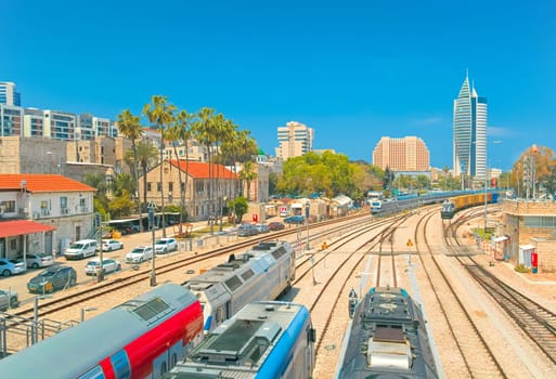 Haifa, Israel - 10 May, 2023: View of modern diesel locomotives with cars on rails in the open area of ​​the Israel Railway Museum.