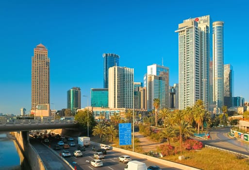 Tel Aviv-Yafo, Israel - 1 May, 2023: Cityscape with skyscrapers in the downtown near Savidor Central train station. High quality photo
