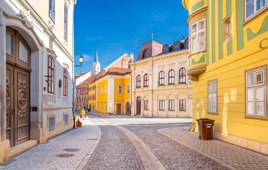Sopron, Hungary - 13 October 2023: Colorful historical houses in one of the main streets in the old town of Sopron.