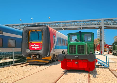 Haifa, Israel - 10 May, 2023: Modern and old diesel locomotives in the open air part of The Israel Railway Museum.