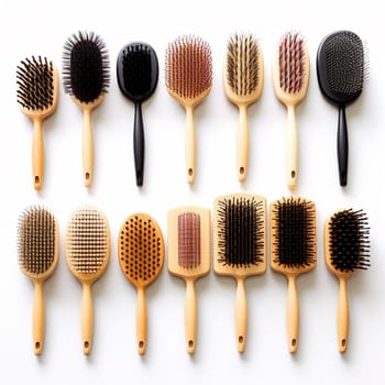 Collection of various hairbrushes neatly arranged on a light background