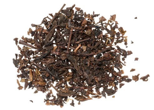 Dry black tea leaves on isolated background, top view