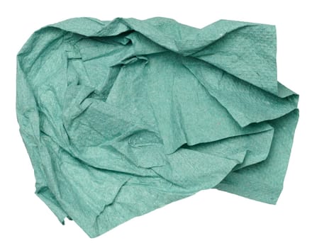 Green crumpled paper napkin on isolated background, close up