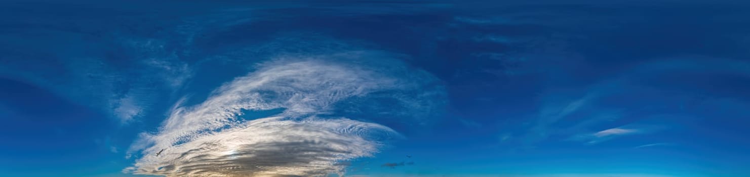 Blue sky with Cirrus clouds Seamless panorama in spherical equirectangular format. Complete zenith for use in 3D graphics, game and for composites in aerial drone 360 degree panoramas as a sky dome.