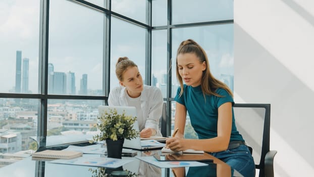 Skilled businesswoman look stress while discuss about financial strategy. Smart business team brainstorming, talking consulting sales plan, idea by using statistic document with tension. Tracery