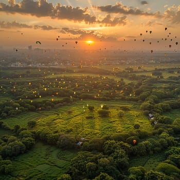 Aerial view of lush green field with kites flying above for Pakistani Spring Festival.