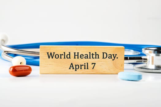 Medical concept. World health day concept. World Health Day 7 April. on a wooden block on a gray background