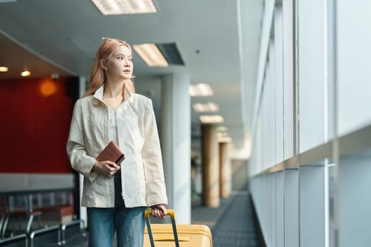 Airport travel and woman with passport, flight ticket or information of immigration, journey and luggage. identity document and international registration.