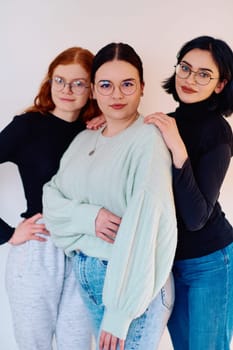 Familial love and unity as three sisters embrace each other against a pure white backdrop, symbolizing the enduring bond of sisterhood.