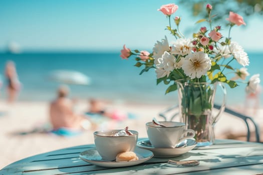 A beautiful table setting with two cups of coffee and a vase of flowers, surrounded by azure skies and water, creating a peaceful and relaxing environment