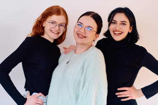 Familial love and unity as three sisters embrace each other against a pure white backdrop, symbolizing the enduring bond of sisterhood.