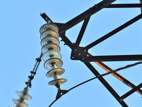 Overhead power transmission towers with ceramic and the glass line insulators