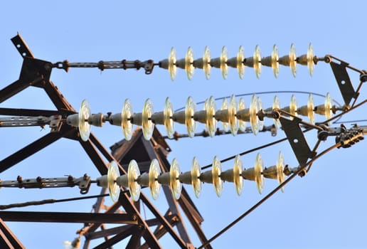 Overhead power transmission towers with ceramic and the glass line insulators