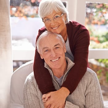 Couple, mature and portrait with embrace, window and home for happy retirement. Senior man, woman and marriage with elderly, care and love for healthy relationship and romantic rest and relaxation.