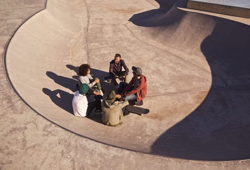 Sunshine, skate park and friends with conversation, relax and communication with weekend break or group. People, outdoor or skaters with summer or recreation with diversity or support with discussion.