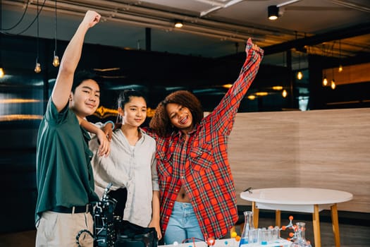 Students in classroom raise hands joyfully marking success of their exploration into futuristic robotic arm technology during exciting robotics class. Innovation and Technology embraced