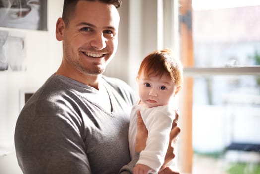 Father, baby and home portrait with care, love and support together with family bonding and development. Dad, smile and young child in a house with kid and parent happy about infant growth at window.