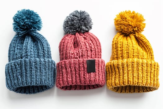 A row of three knitted hats displayed side by side.