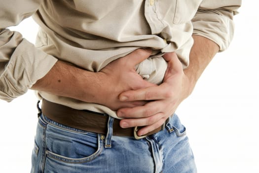 Person with stomach pain on a white background, stomachache, Abdomen bloating concept.