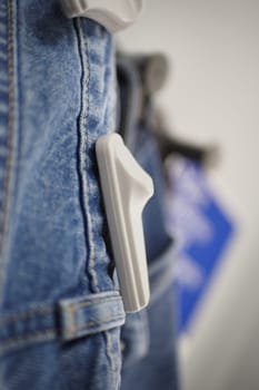 Clothing security tag on a jeans