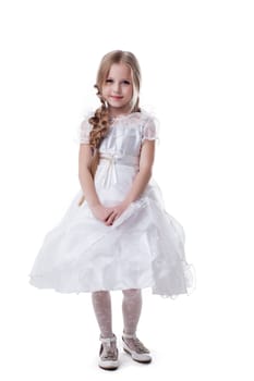 Pretty blonde kid in white dress isolated on white