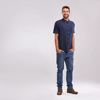 Creative, businessman and portrait of fashion in studio, background and mockup with confidence. Happy, man and relax in jeans with pride or casual style in business as art director or entrepreneur.