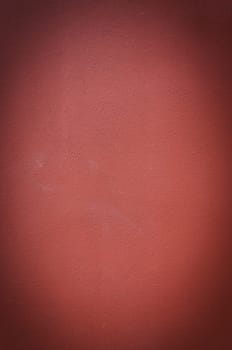 Red plastered rusty concrete wall