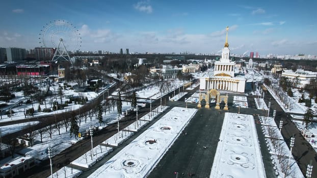 Top view of historic Soviet Square in winter. Creative. Historical buildings with monuments and arches in city center. Winter cityscape with historical center and square.