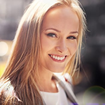 Woman, portrait and smile with closeup, bokeh and commute for work or career. Designer, job and new york street with urban, summer and happiness with confident or creative business travel in downtown.