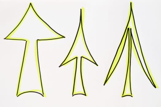 Three bright neon, green and black arrows hand-drawn on white background. Thick, medium, thin artistic arrows
