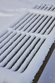 Serene Winter Day at Freimann Square, Fort Wayne - Undisturbed Snow Blankets Park Bench in Daylight