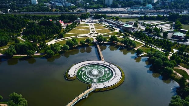 Geometric landscape paths and fountains. Creative. Top view of ornamental park with paths and fountain. Historical park with fountain in pond and luxurious geometric alley.