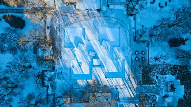 Winter Geometry: Serene Aerial View of Snow-Blanketed Downtown Fort Wayne, Indiana