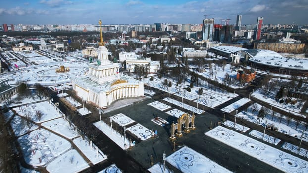 Top view of square with historical building in winter. Creative. center of the Soviet city with square and historical building. Beautiful urban landscape with historical center and square in winter.