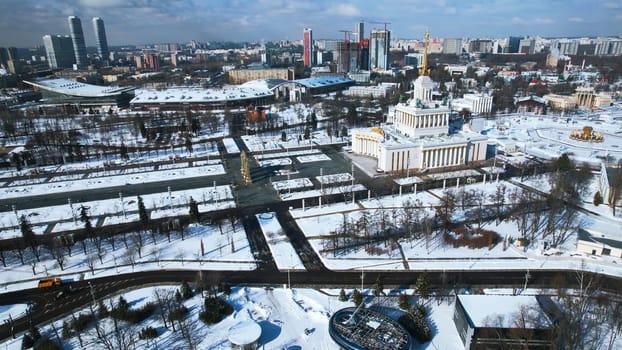 Top view of square with historical building in winter. Creative. center of the Soviet city with square and historical building. Beautiful urban landscape with historical center and square in winter.