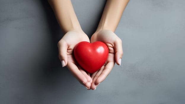 Female hands holding red heart on grey background, top view, copy space , Generate AI