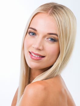 Blonde woman, hairstyle and happy in studio portrait, wellness and results by white background. Girl, person and model with hair care for beauty, transformation or change with natural glow for health.