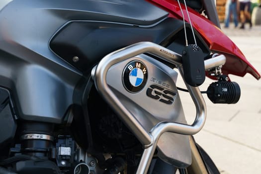 Warsaw, Poland - August 6, 2023: Detailed view of the BMW R1200 motorcycle. Logo close-up.