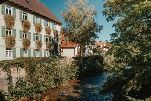 Old national German town house. Old Town is full of colorful and well preserved buildings. Baden-Wurttemberg is a state in southwest Germany bordering France and Switzerland. The Black Forest, known for its evergreen scenery and traditional villages, lies in the mountainous southwest. Stuttgart, the capital, is home to Wilhelma, a royal estate turned zoo and gardens. Porsche and Mercedes-Benz have headquarters and museums there. The 19th-century Hohenzollern Castle sits in the Swabian Alps to the south.