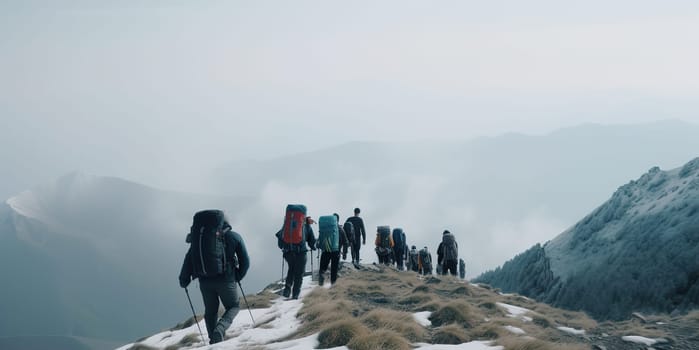 hiking in winter mountains on a cloudy day. People traveling and sport concept