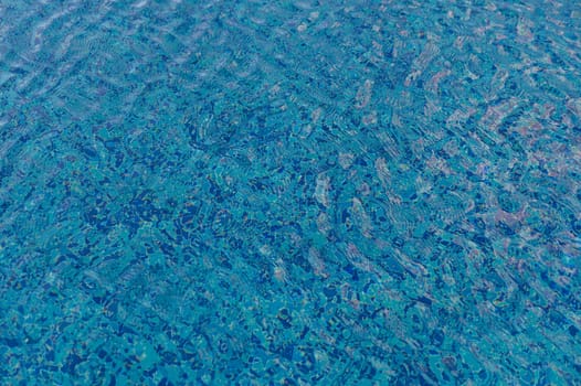 Ripple Water in swimming pool with sun reflection 9