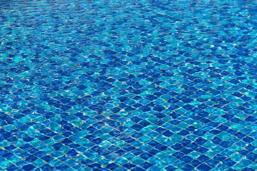 Ripple Water in swimming pool with sun reflection 7