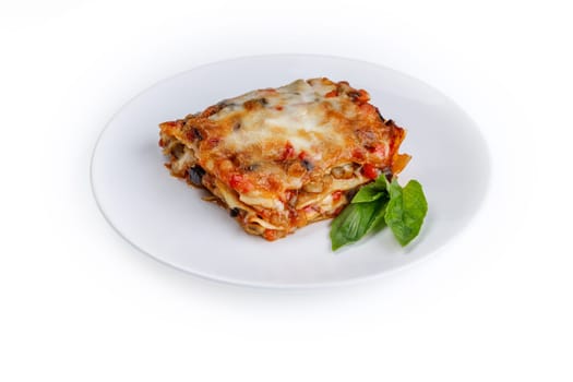 slice of lasagna with melted cheese on top and minced meat filling close-up isolated on white background with shadow 1