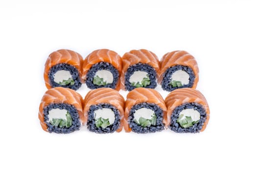 Sushi roll with black rice and salmon isolated