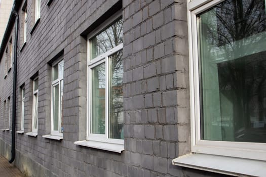 Windows on a modern two-storey building close up