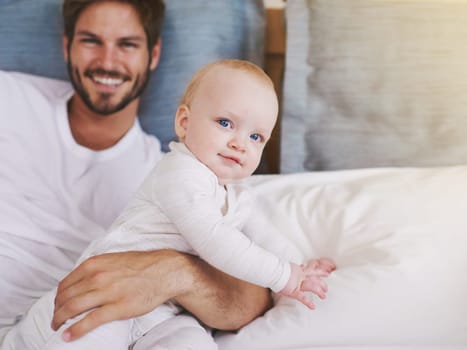 Family, happy and father with baby in bedroom for bonding, relationship and care for parenting. Love, portrait and dad playing with newborn infant for child development, support and affection in home.