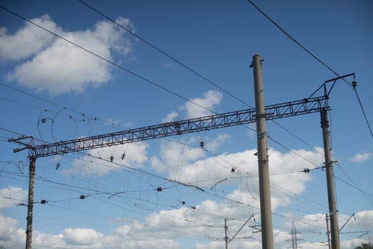 overhead power lines providing to electric trains - image