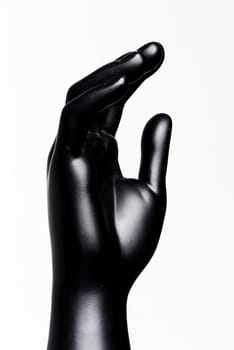 Hand of male black mannequin on a white background - image