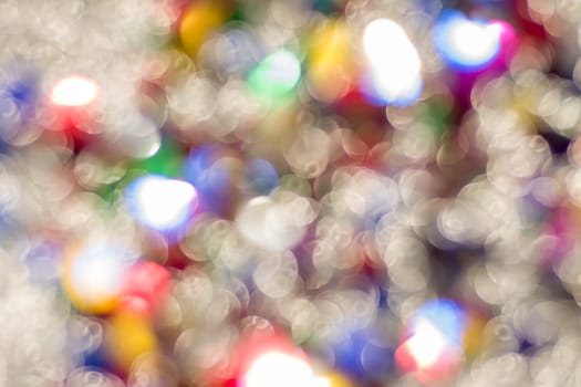 Abstract glitter color lights chrismas background. de-focused - image